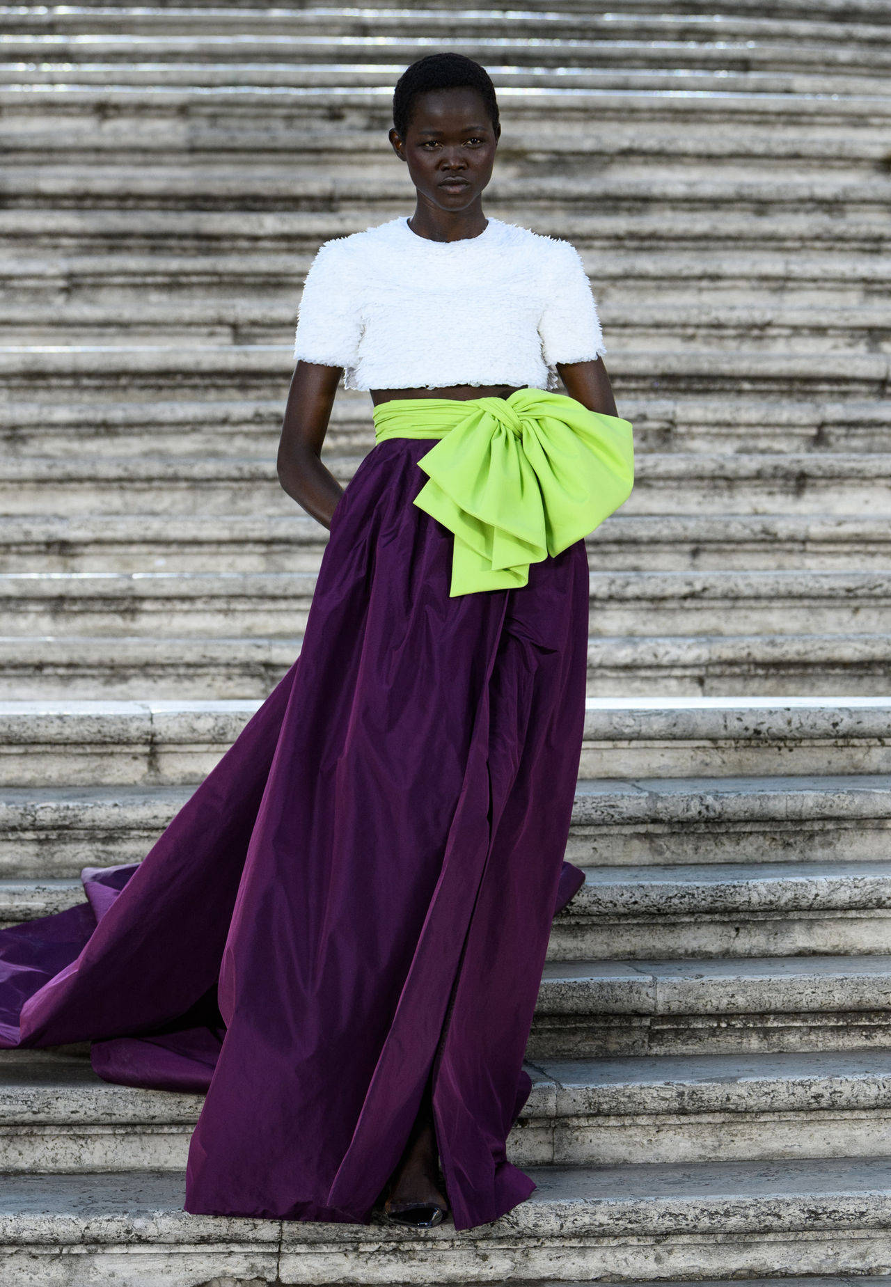 Valentino Model In Purple And White Background