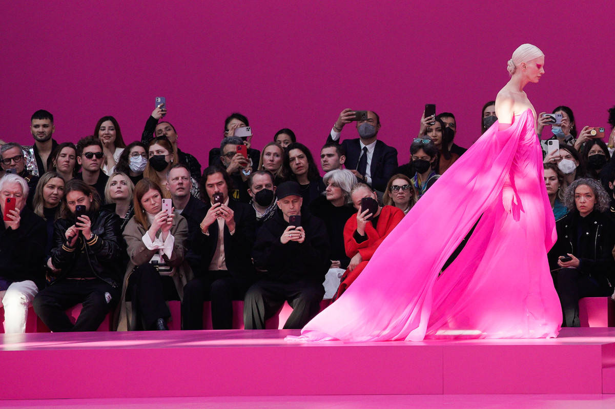 Valentino Model With Flowing Dress Background