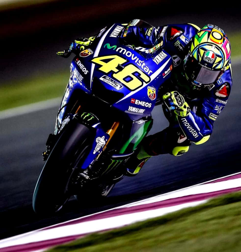 Valentino Rossi Triumphs At The 2015 Qatar Grand Prix Background