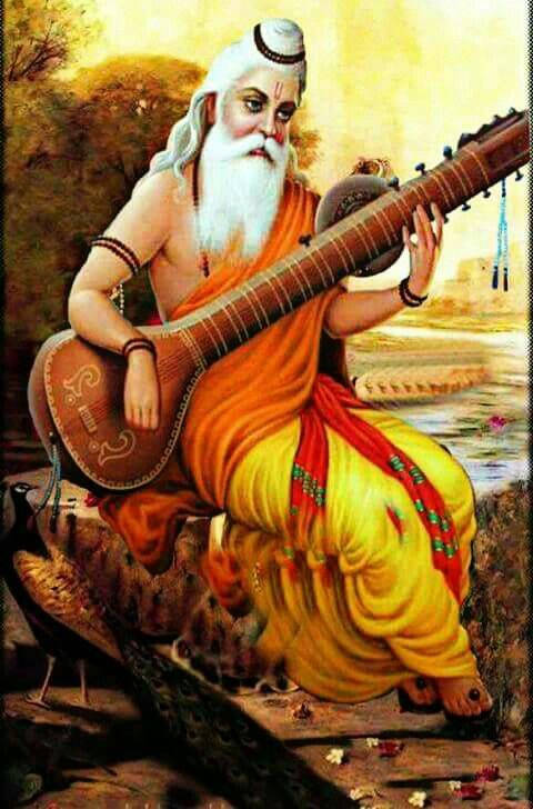 Valmiki Playing Sitar With Peacock Background
