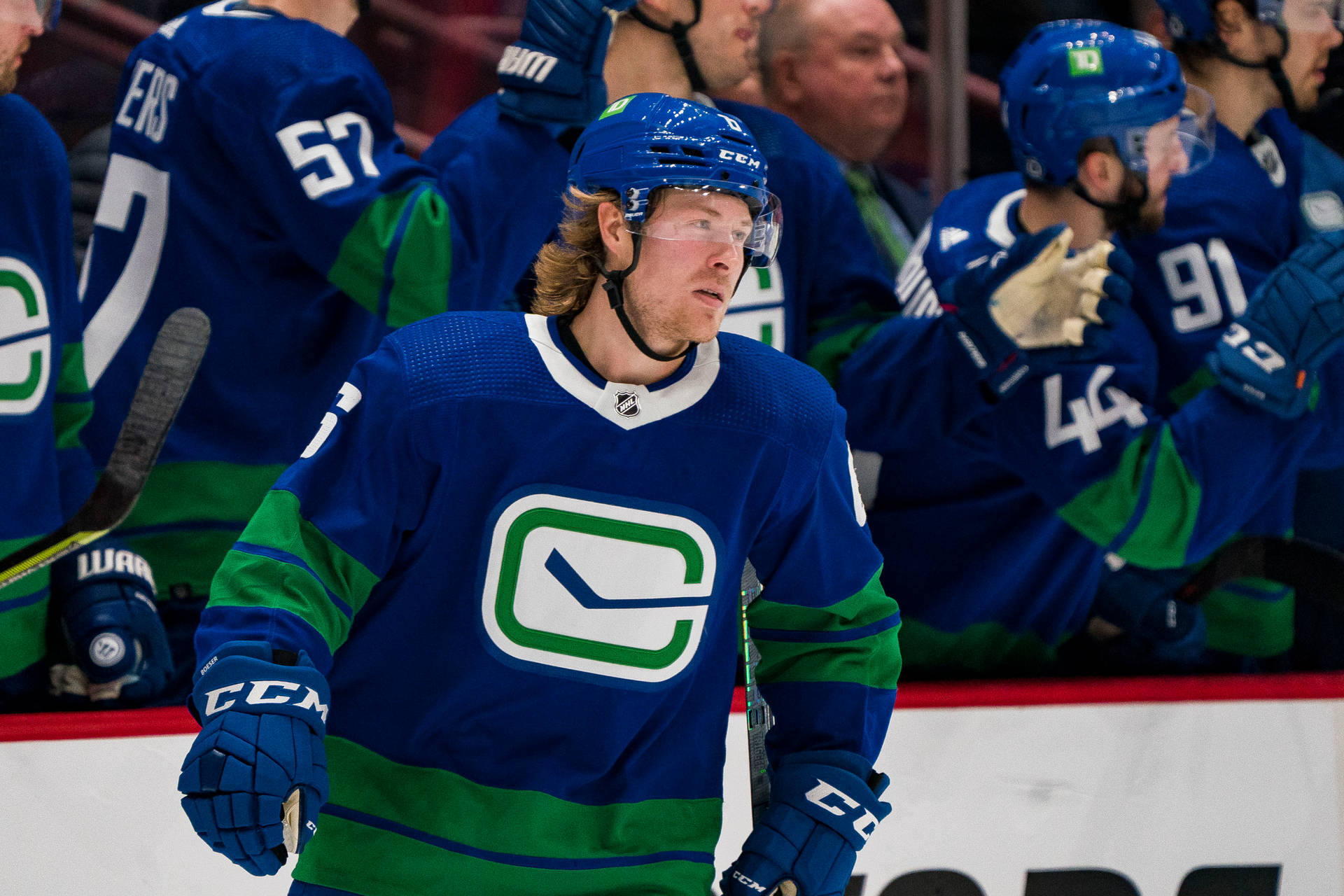 Vancouver Canucks Star Player Brock Boeser In Action Background