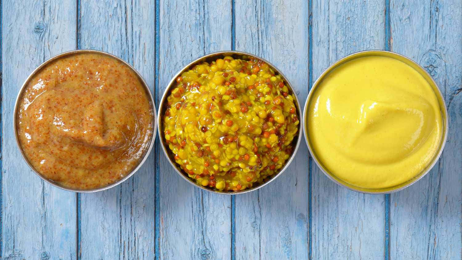 Varietiesof Mustard Condiments Background