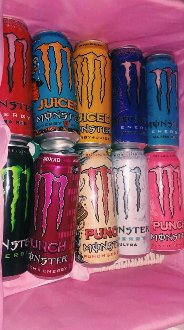 Varietyof Monster Energy Drink Cans Background