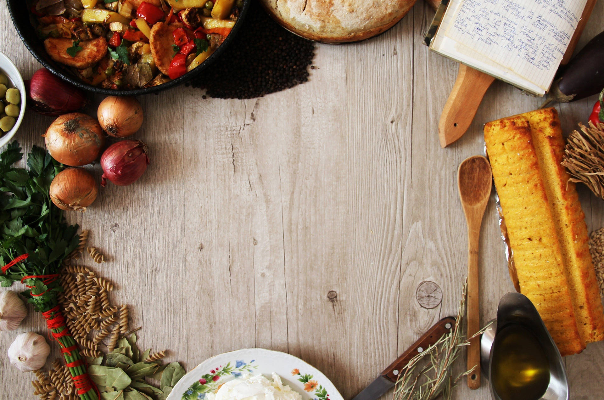 Various Dishes On Wooden Table Background