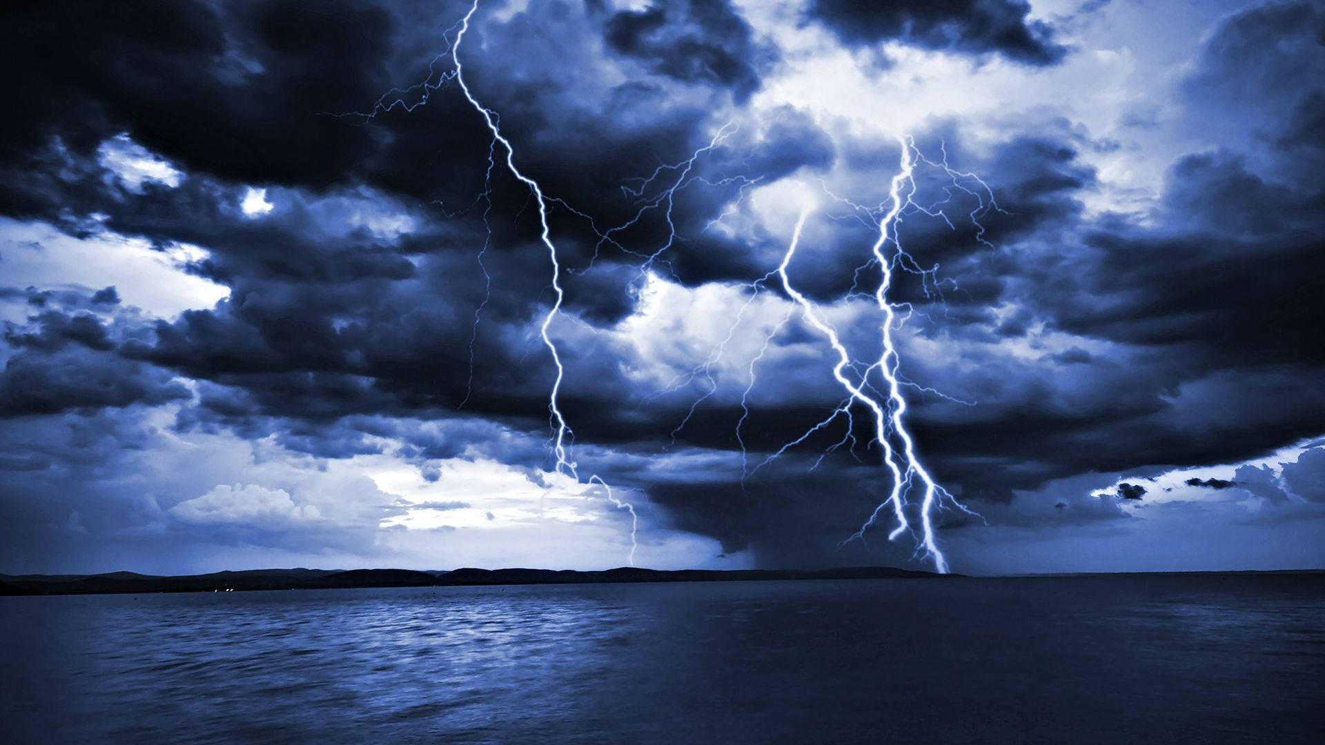 Various Lightning Strikes In Ocean Background