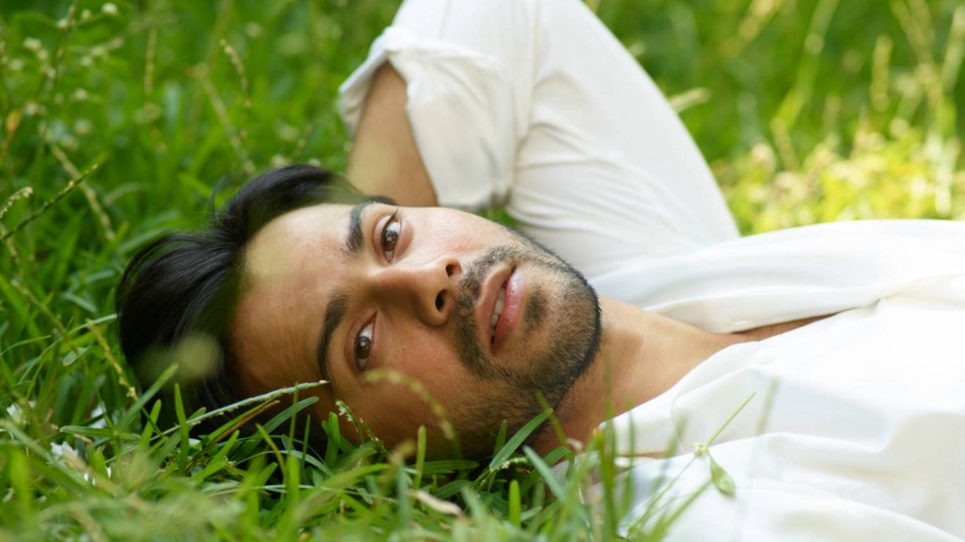 Varun Dhawan On The Grass Background