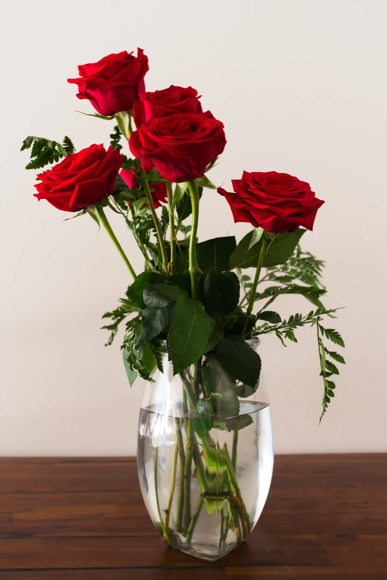 Vase Of Red Rose Flowers Background