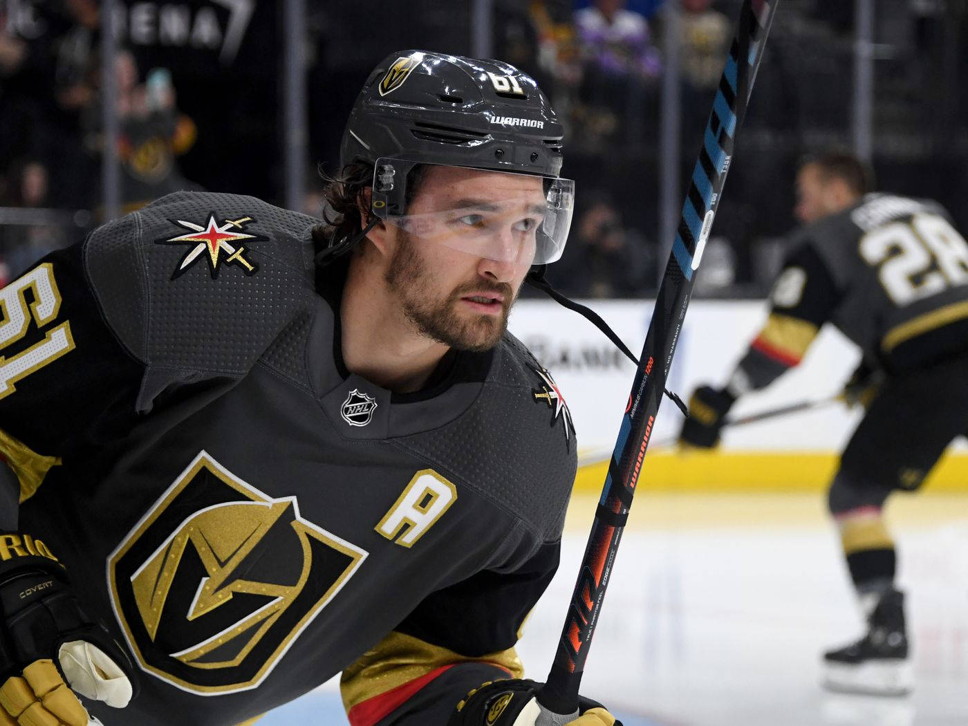 Vegas Golden Knights Athlete Mark Stone Side Angle Shot Background