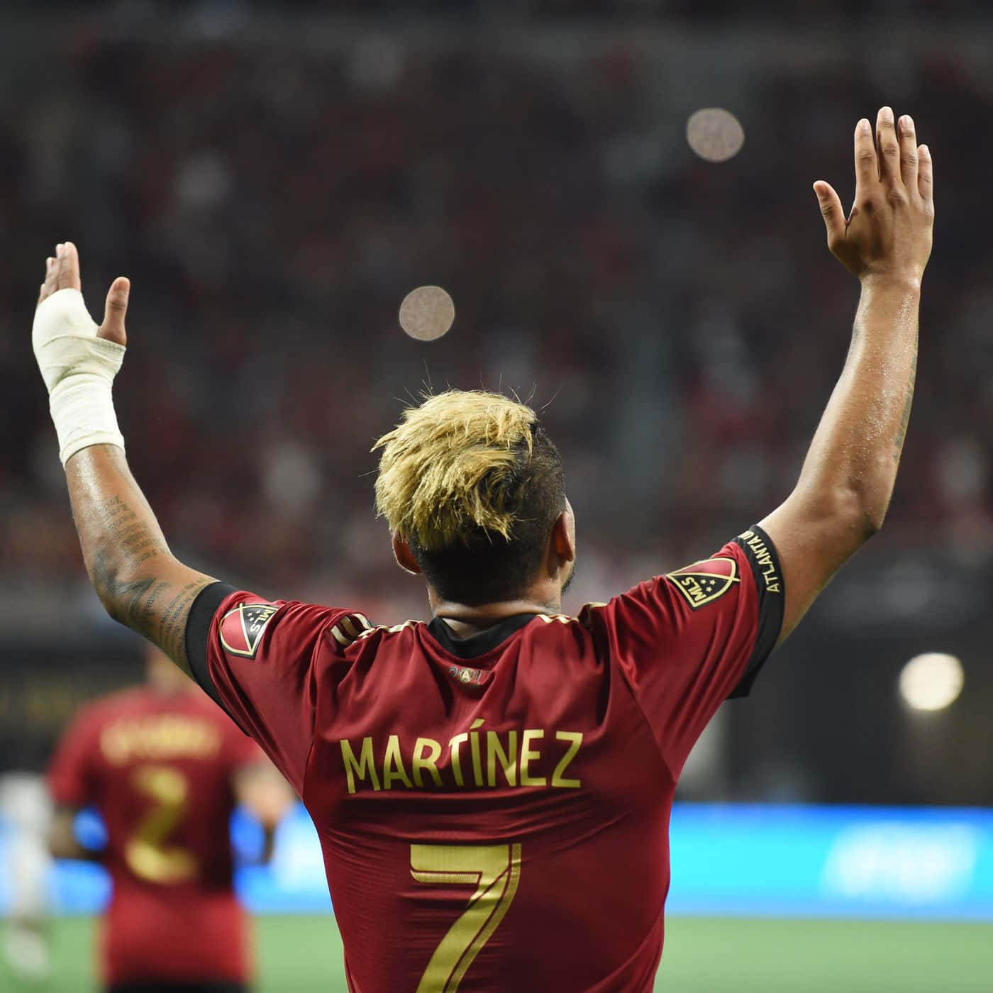 Venezuelan Footballer Josef Martinez Hands Raised Back Shot Background