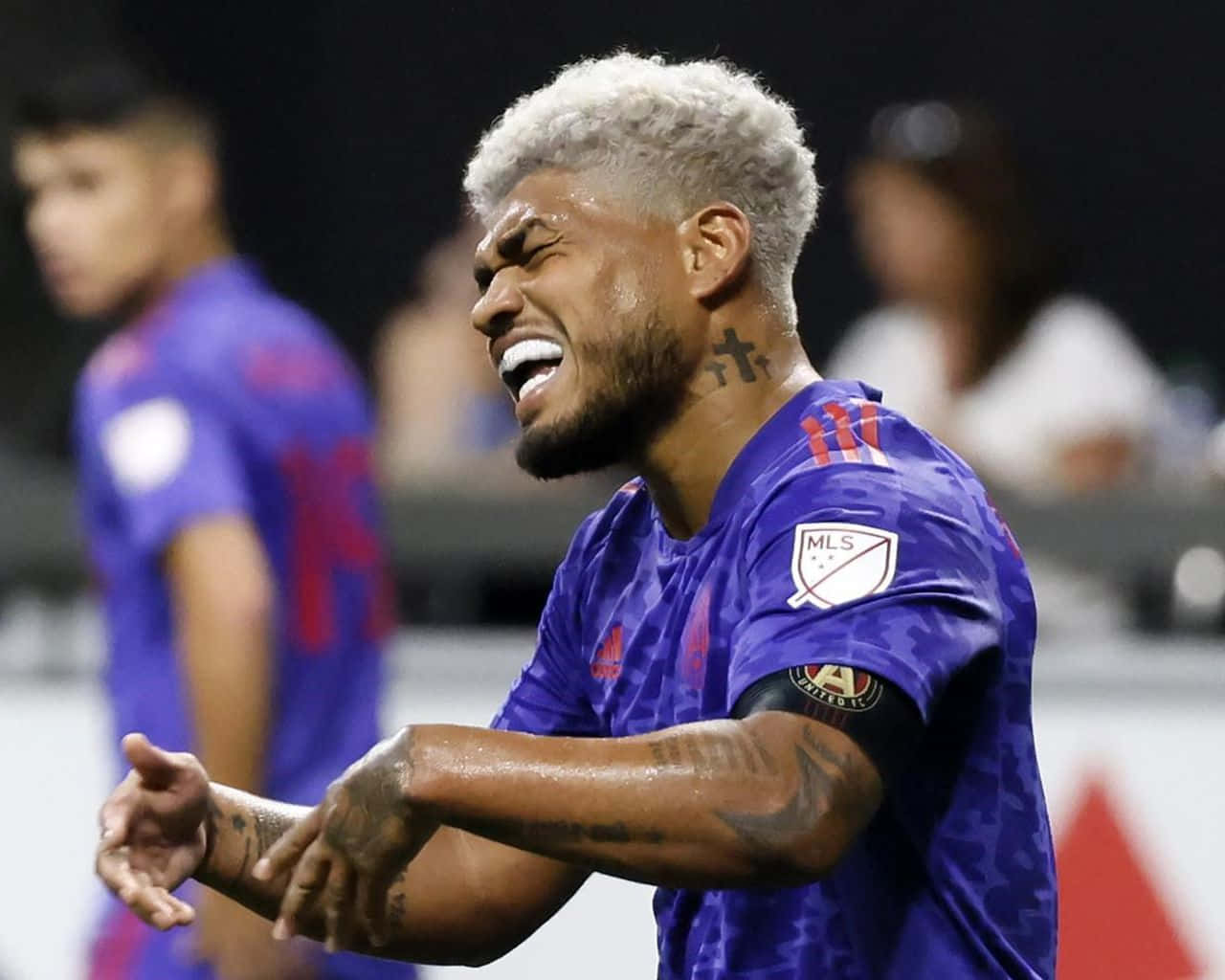 Venezuelan Footballer Josef Martinez Reacts During A Game Background