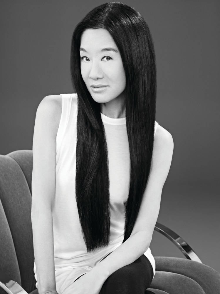 Vera Wang Wearing White Sleeveless