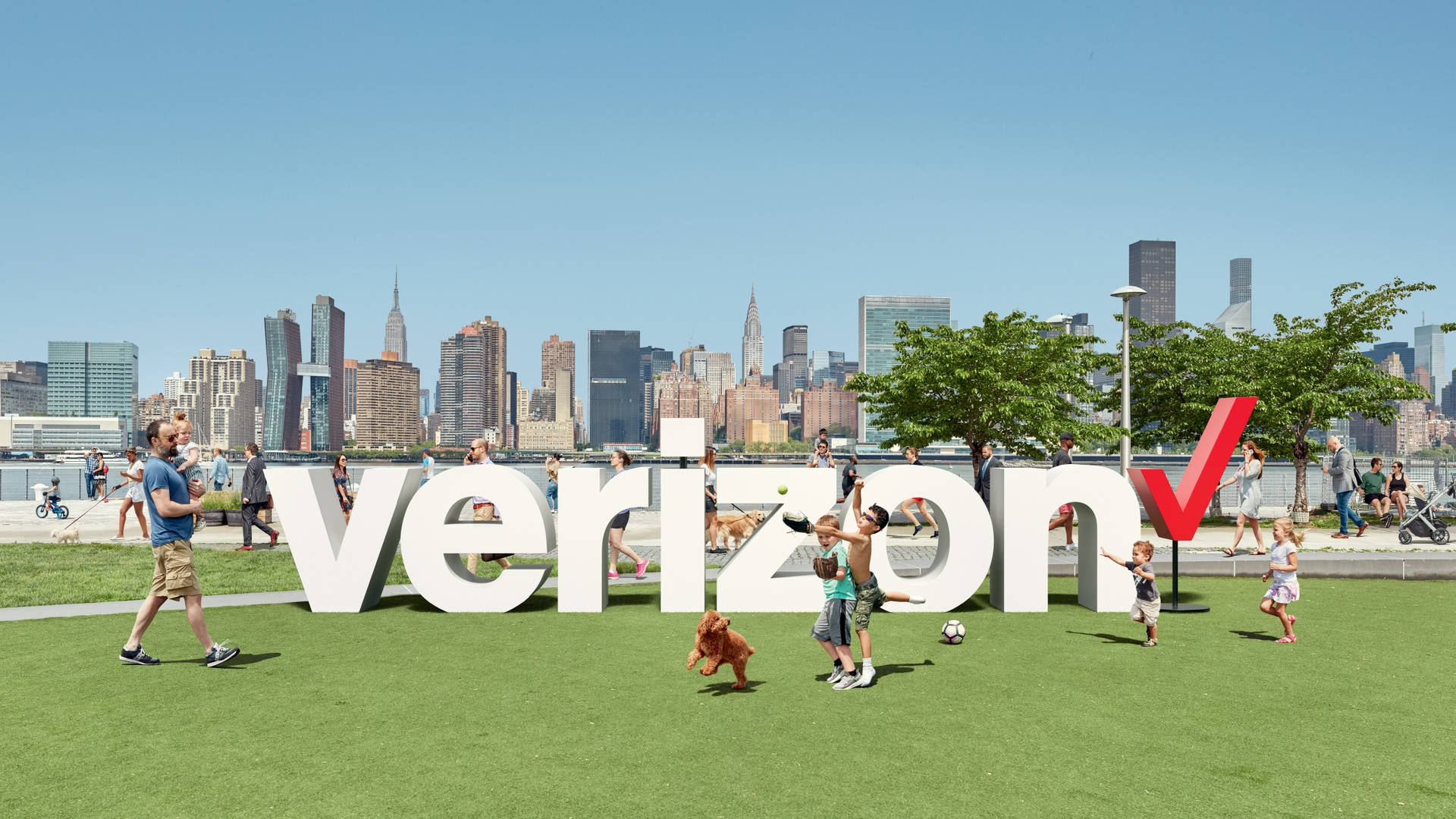 Verizon Logo In A Park Background