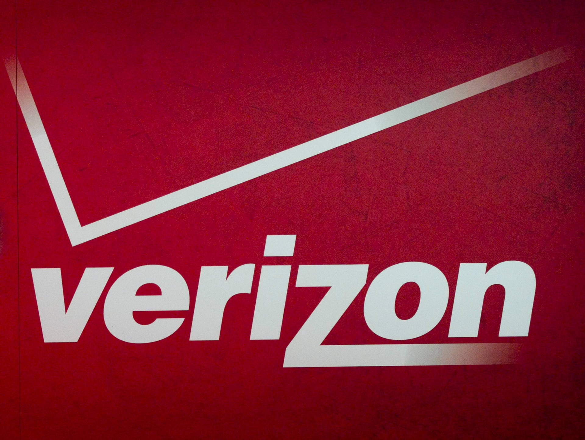 Verizon Logo In Old Red Background
