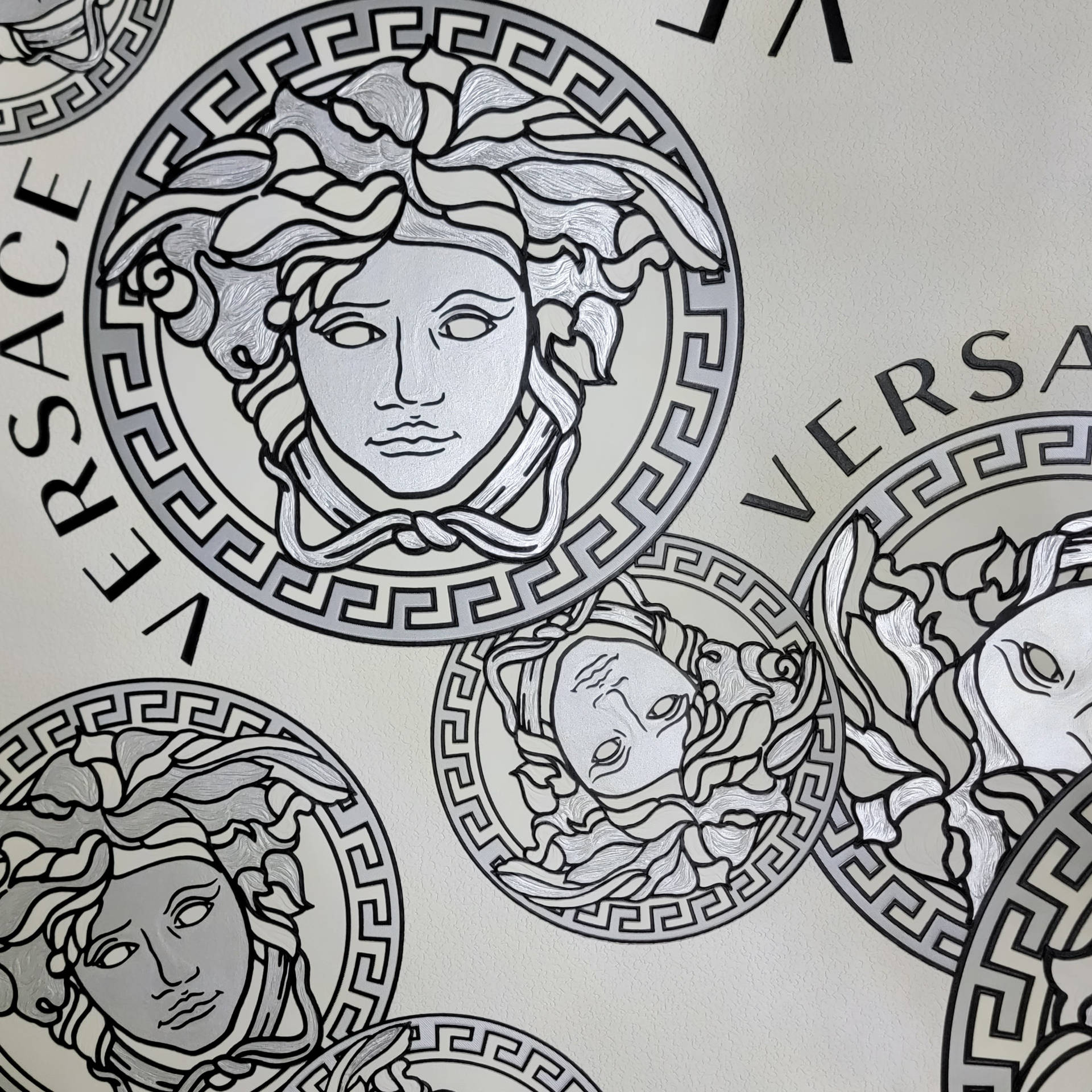 Versace Logo On A White Background Background