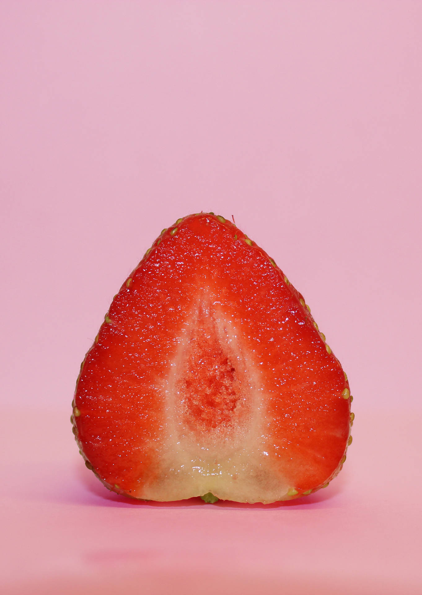 Vertically Cut Strawberry Fruit Background