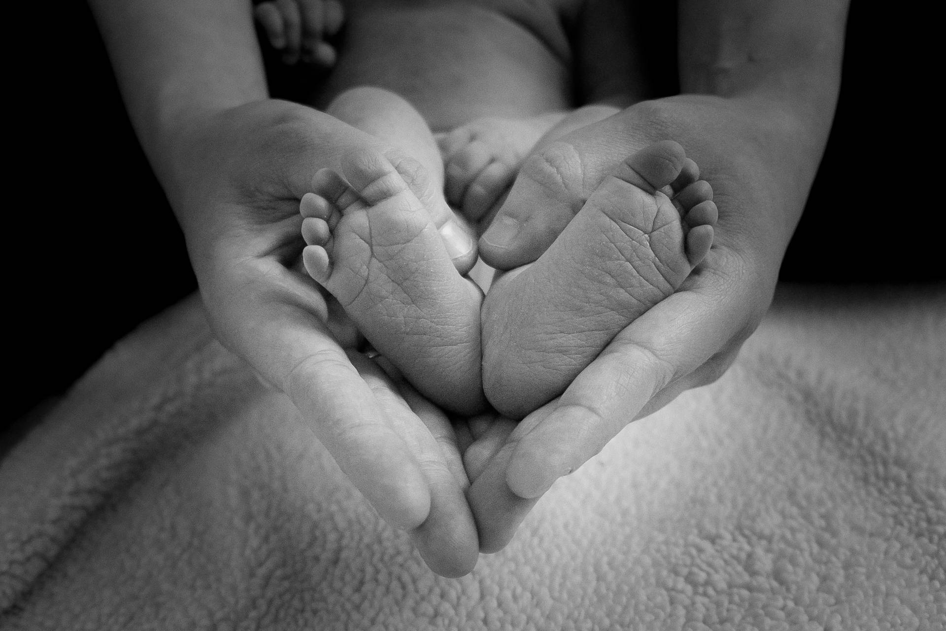 Very Cute Baby Feet Grayscale Background