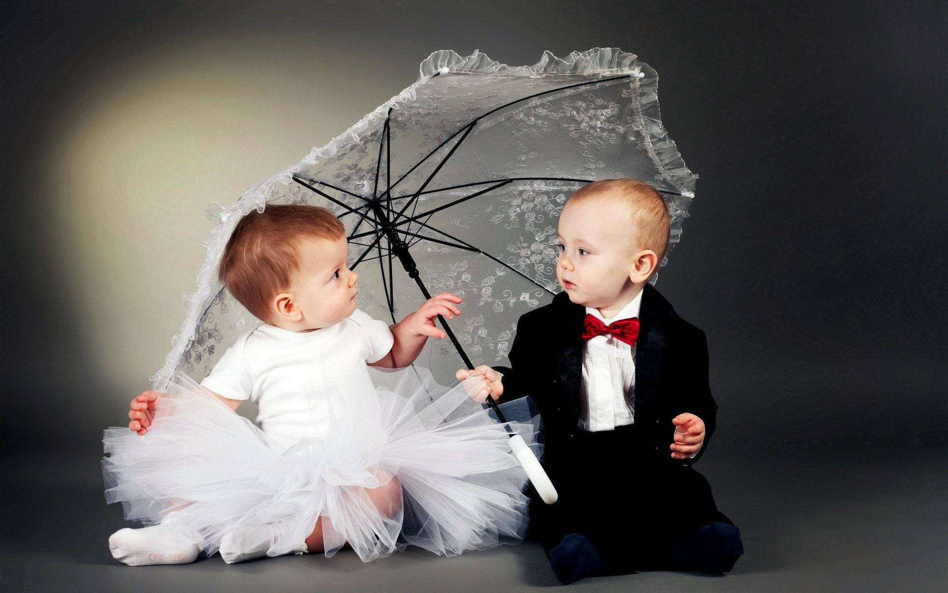 Very Cute Baby Girl And Baby Boy Background