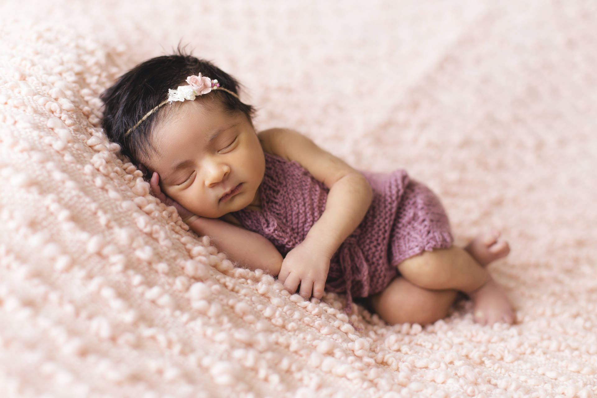 Very Cute Baby In Purple Dress Background