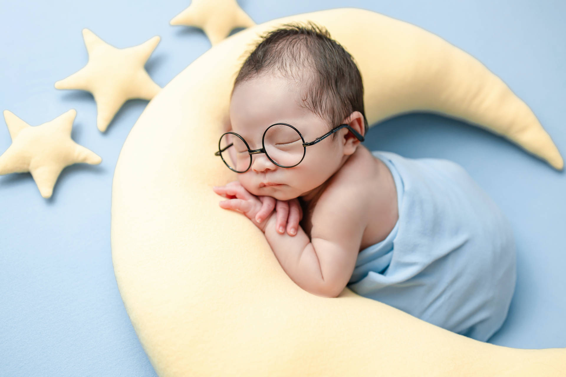Very Cute Baby With Glasses Background