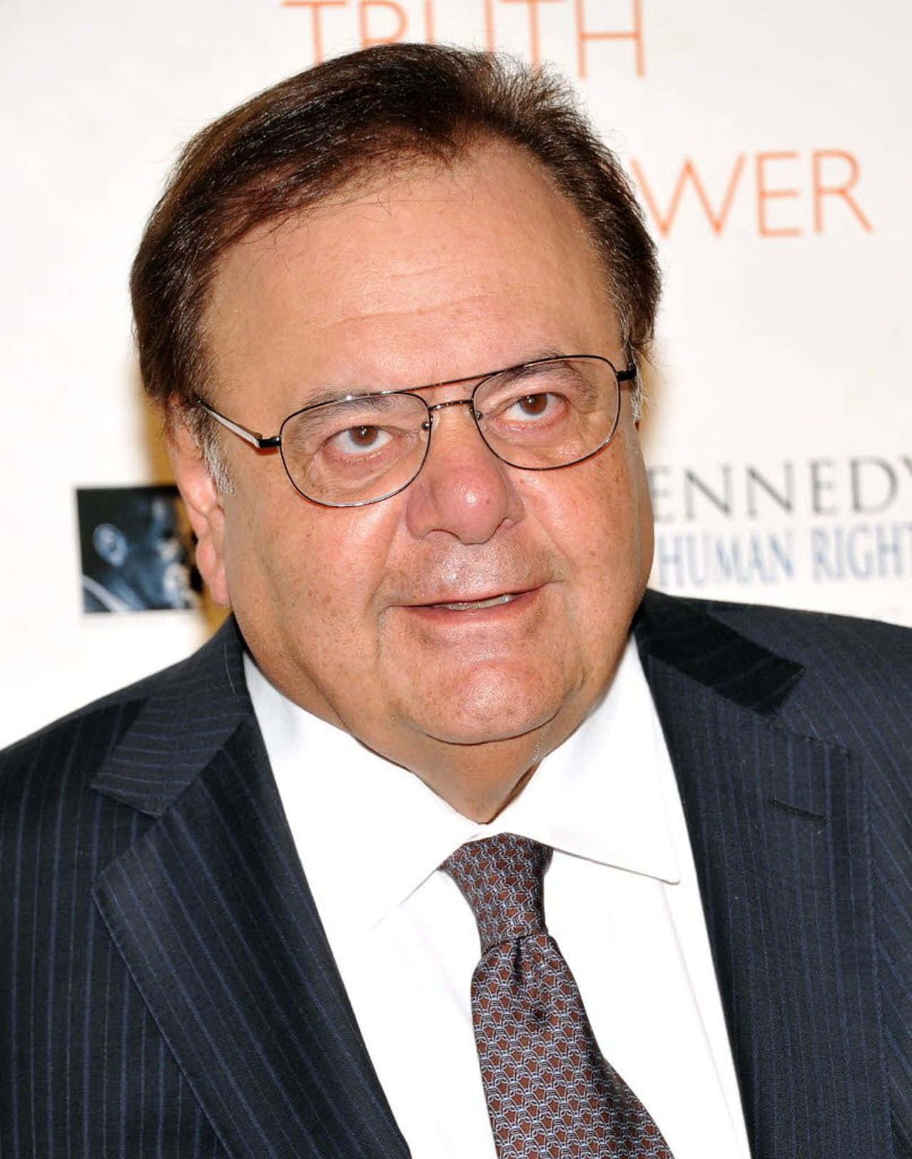 Veteran Actor Paul Sorvino In A Sophisticated Portrait Background