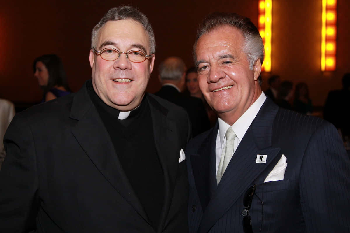 Veteran Actor Tony Sirico Confidently Posing For The Camera. Background
