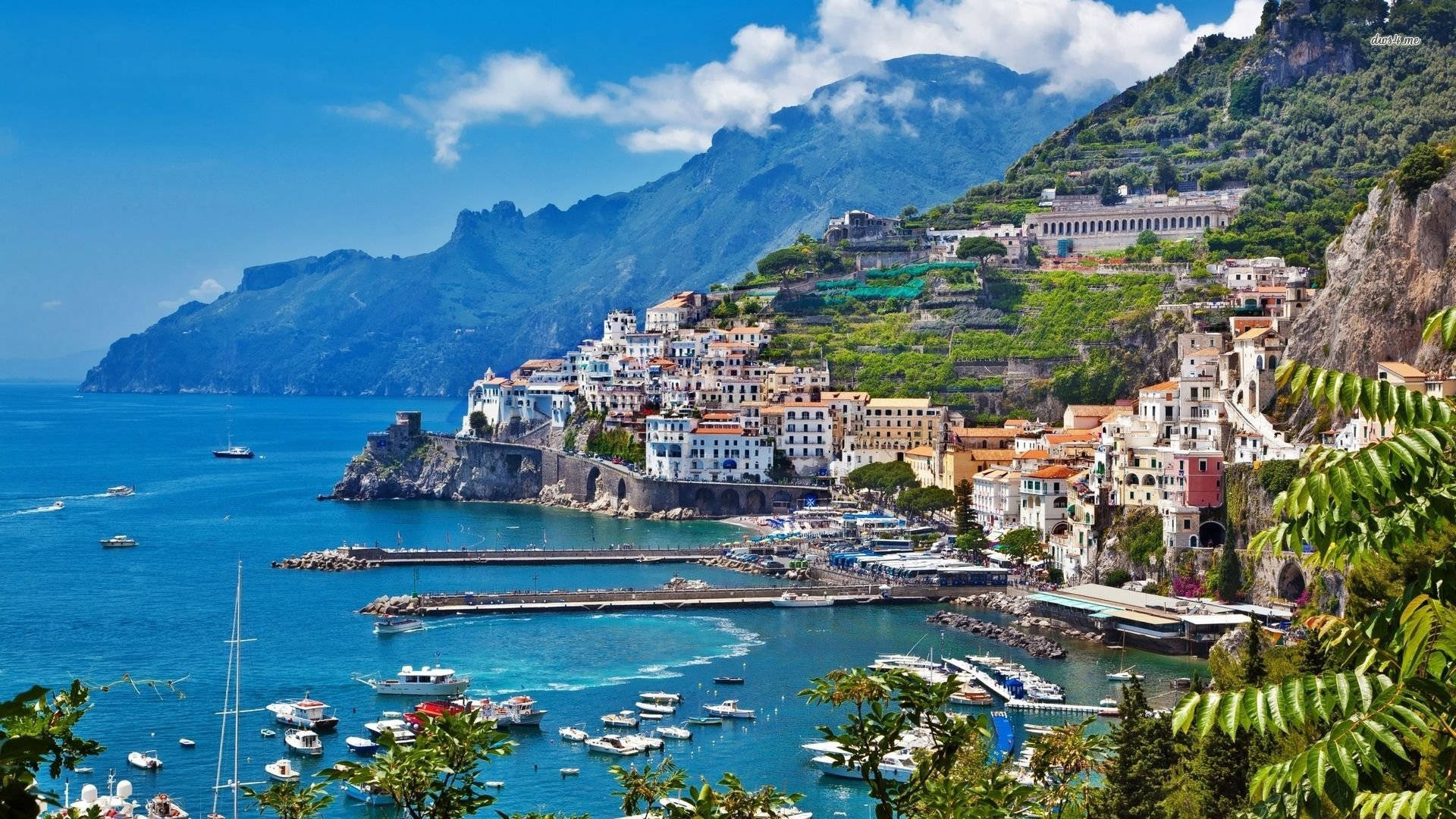 Vibrant Amalfi Coast Ship Pier Background