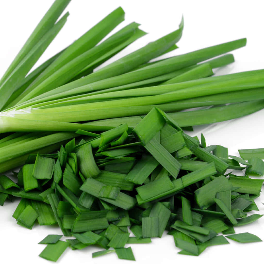 Vibrant And Fresh Green Chives Slices Background