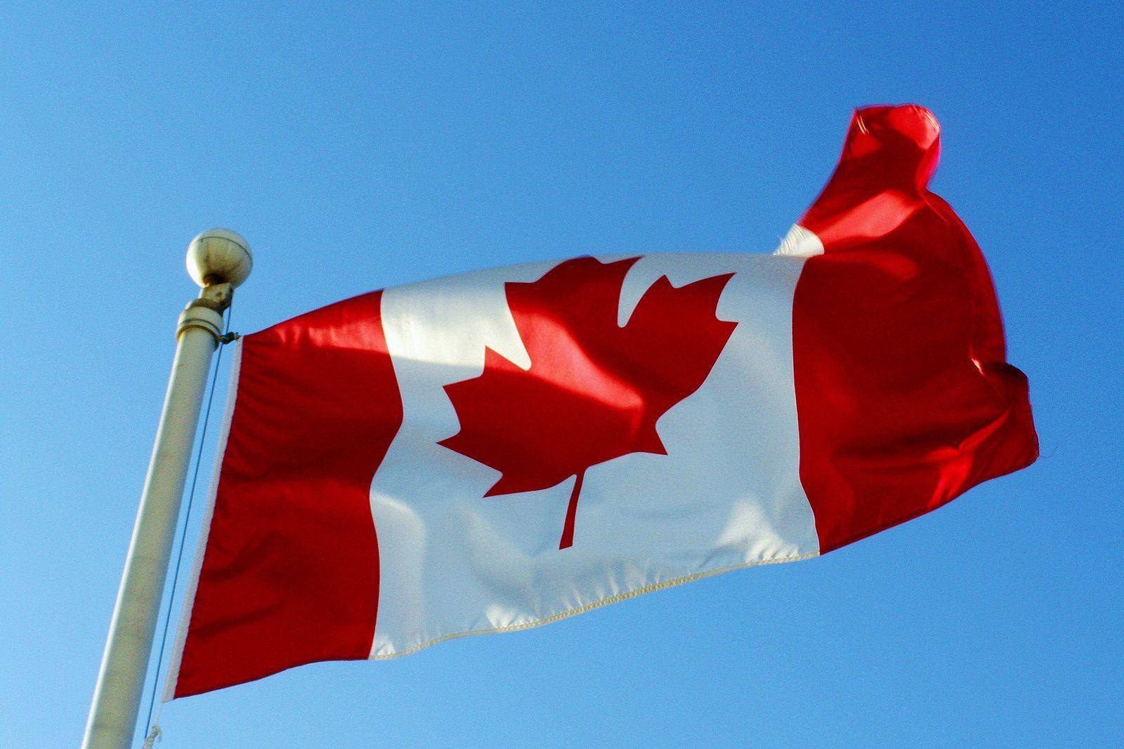 Vibrant And Proud - The Canadian Flag At Its Finest Background