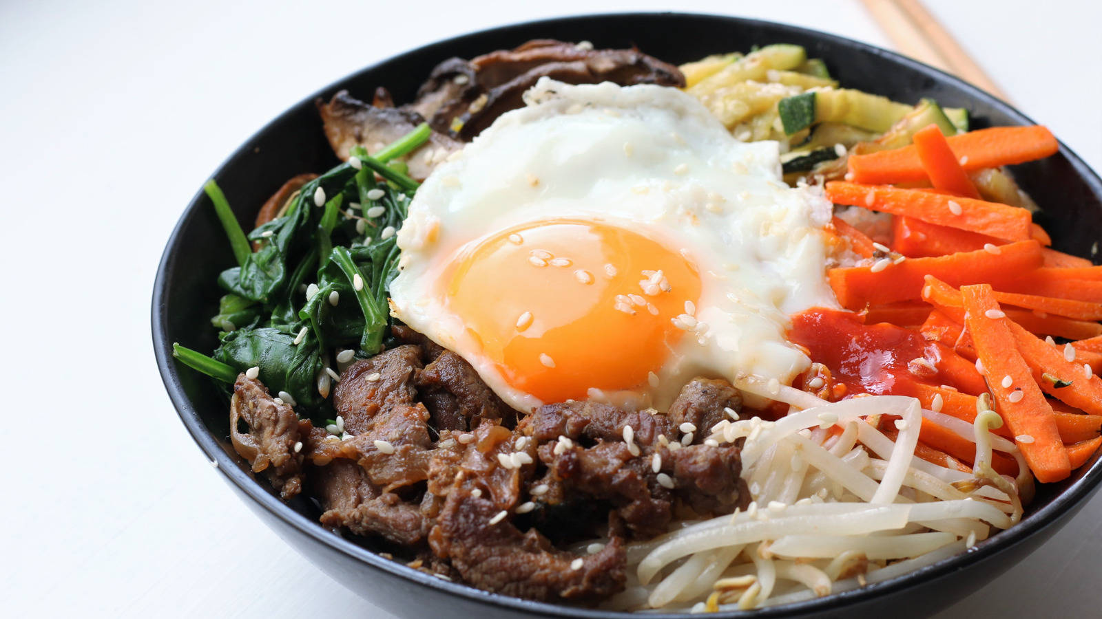 Vibrant And Traditional Korean Bibimbap Dish Background