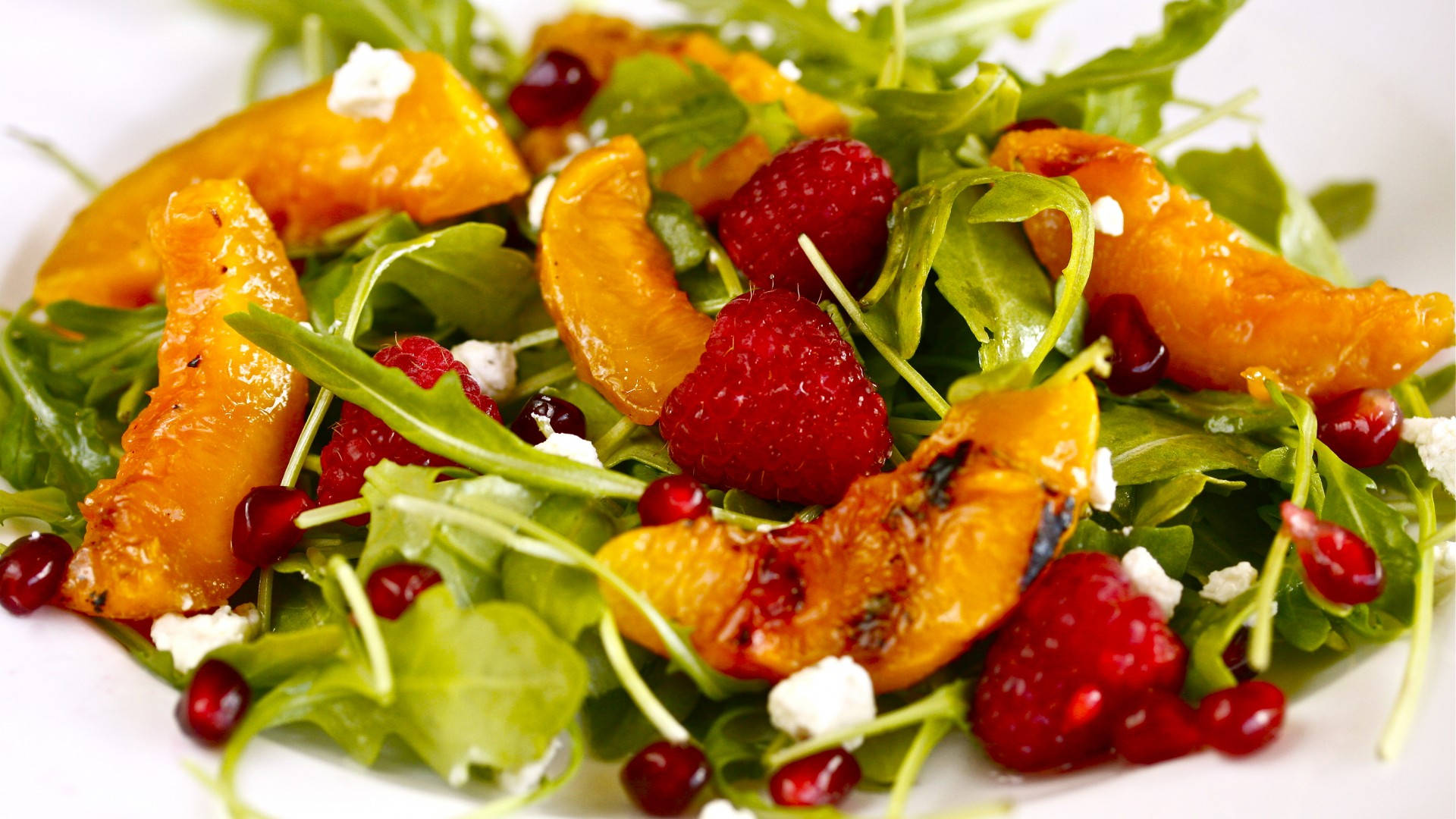 Vibrant Arugula Salad With Berries, Peaches And Pomegranate