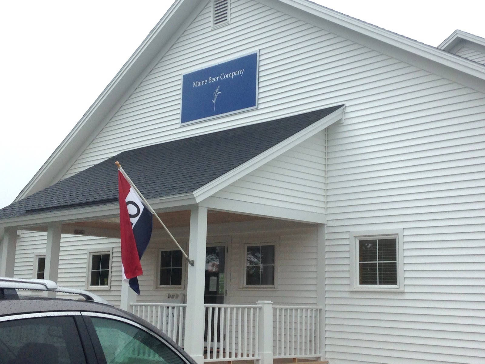 Vibrant Blue Facade Of Maine Beer Company Background