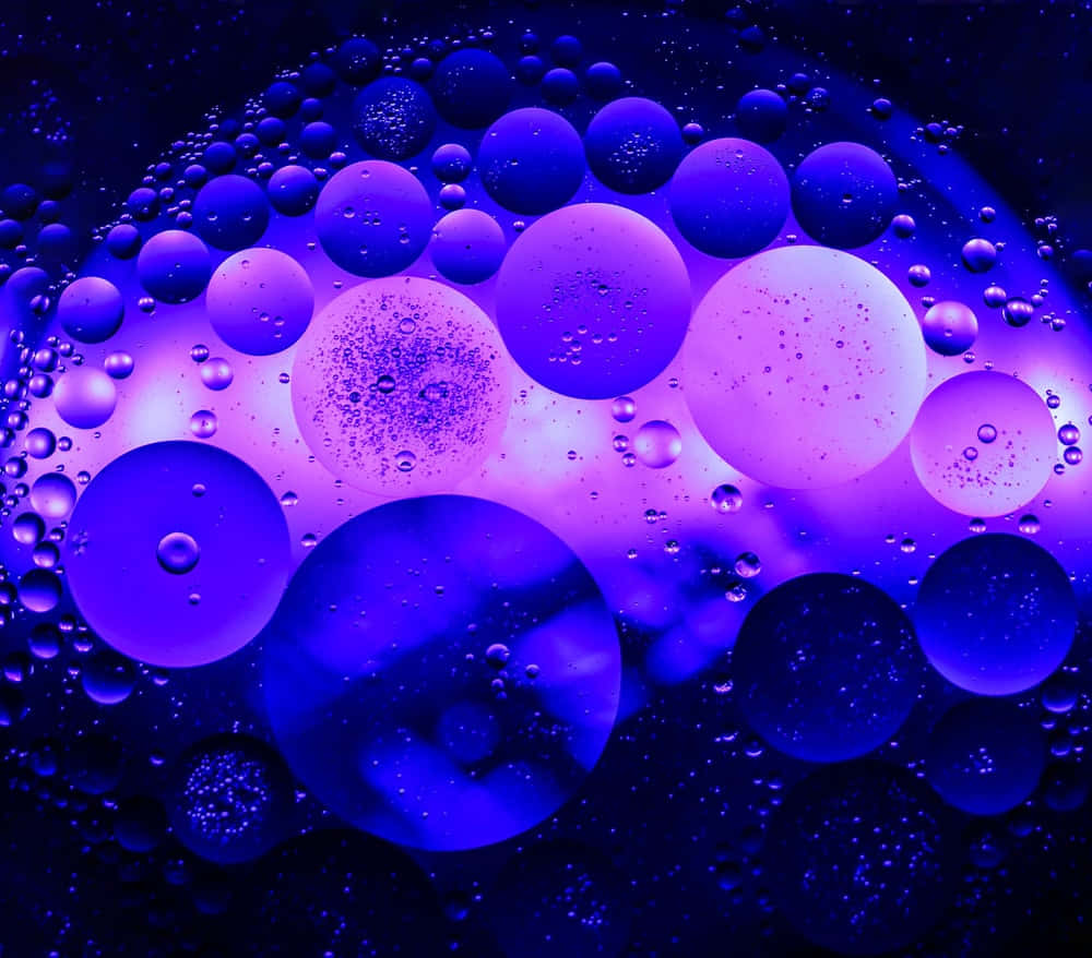 Vibrant Blue Oiland Water Bubbles Background