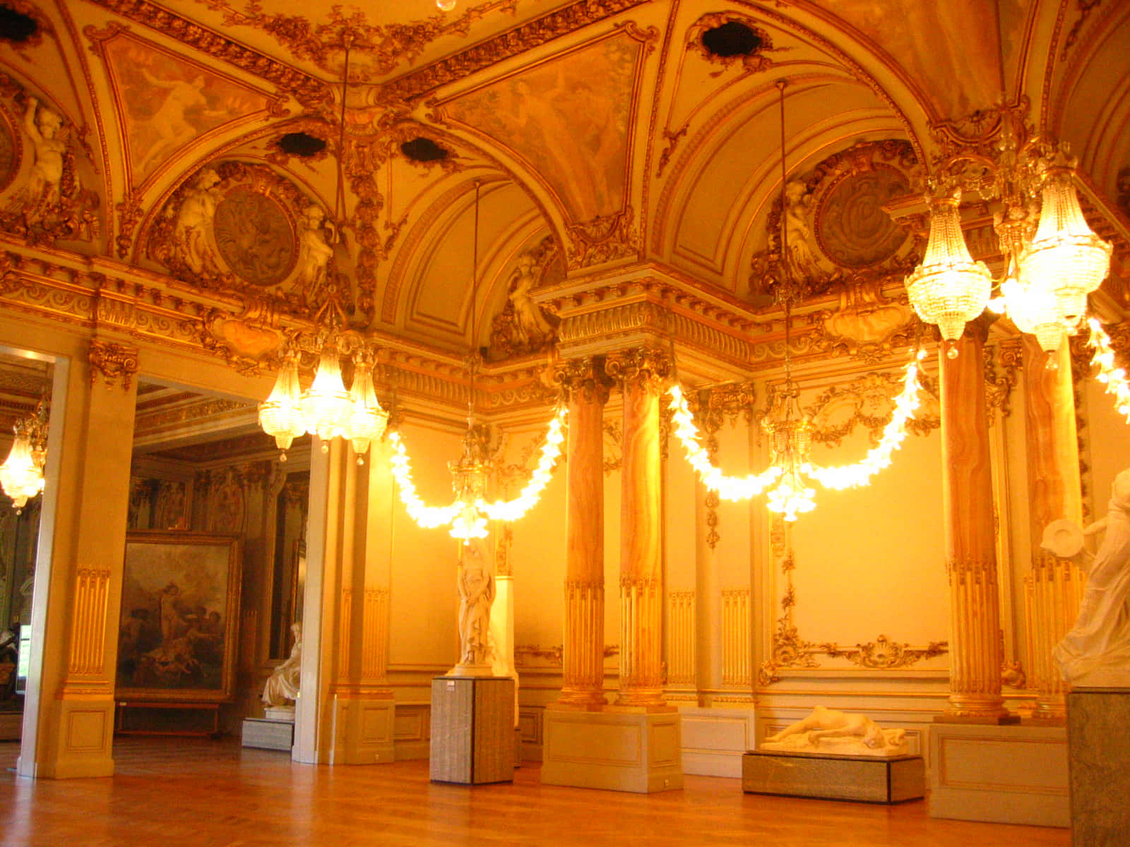 Vibrant Chandeliers At Musée Dorsay Background