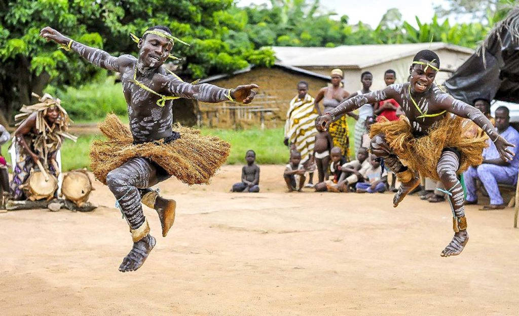 Vibrant Cultural Dance In Ivory Coast Background