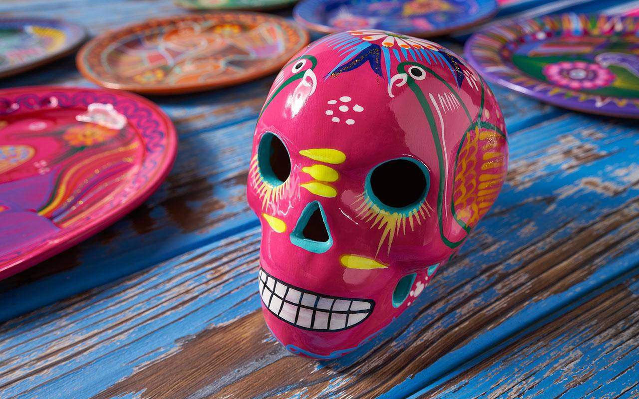 Vibrant Dia De Los Muertos Celebration Skull In Pink And Red Background