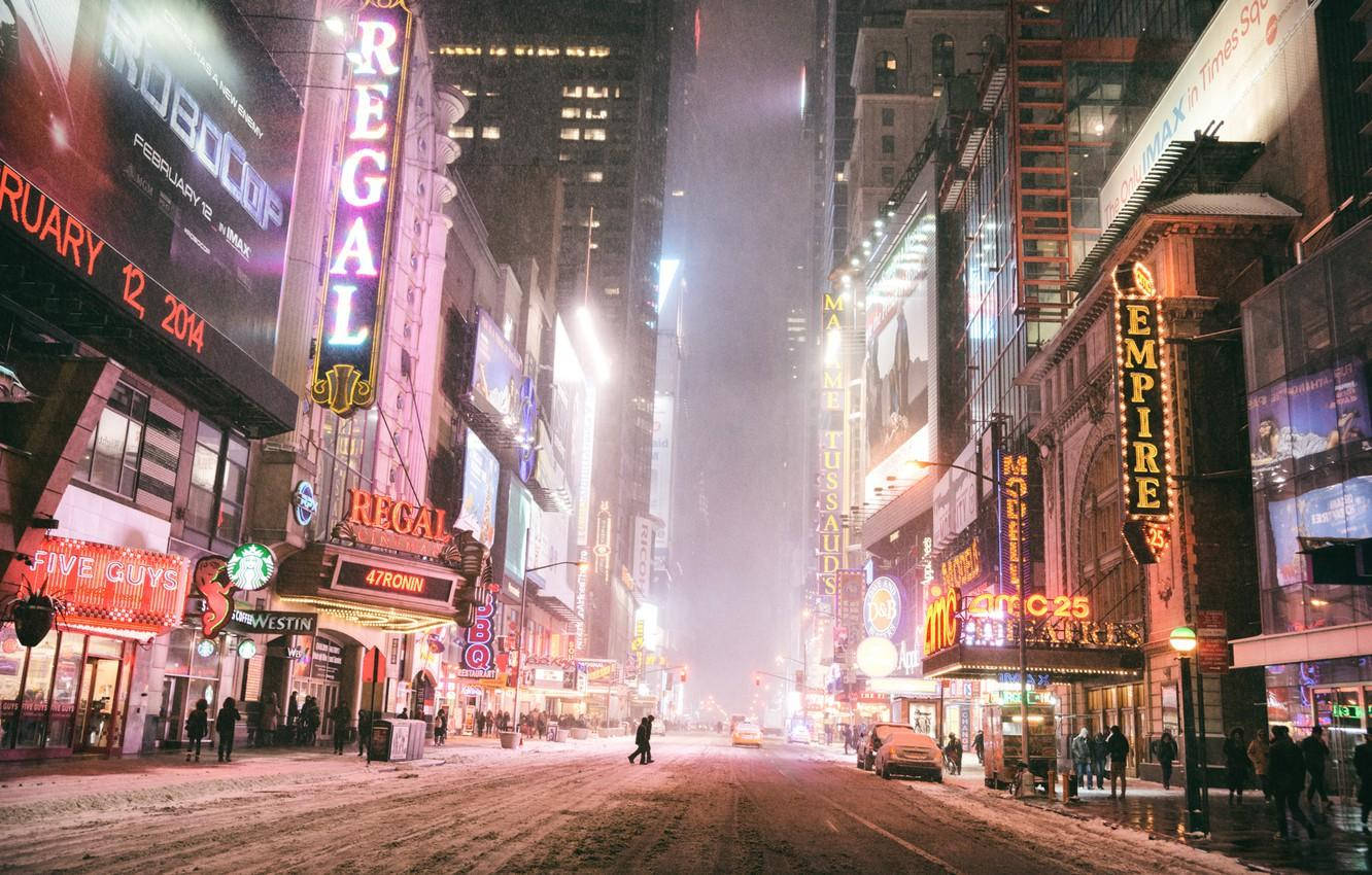 Vibrant Energy Of Times Square At Night Background