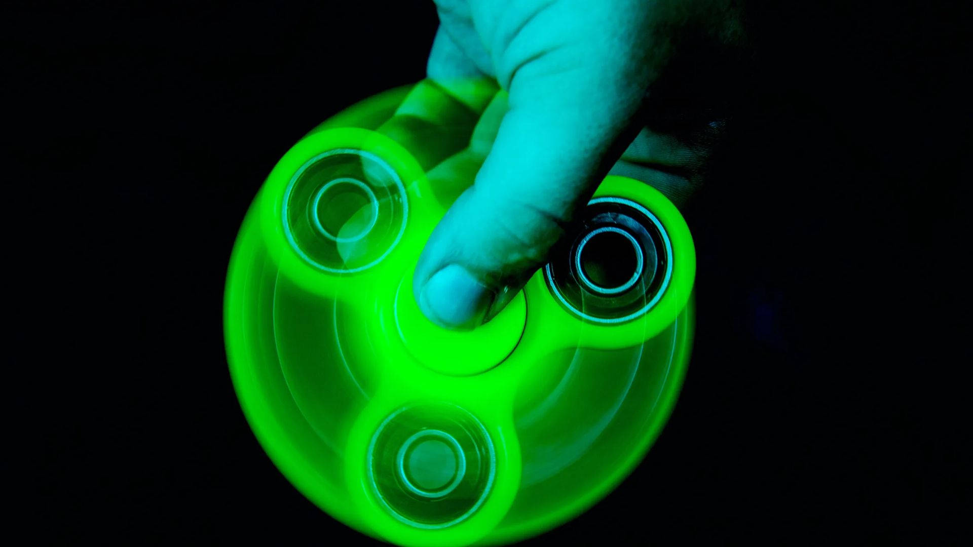 Vibrant Glowing Fidget Toy Background