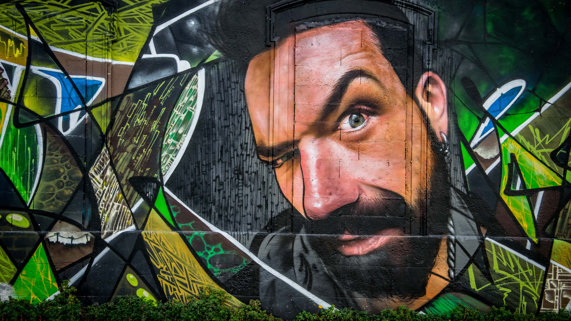 Vibrant Graffiti Illuminating The Streets Background