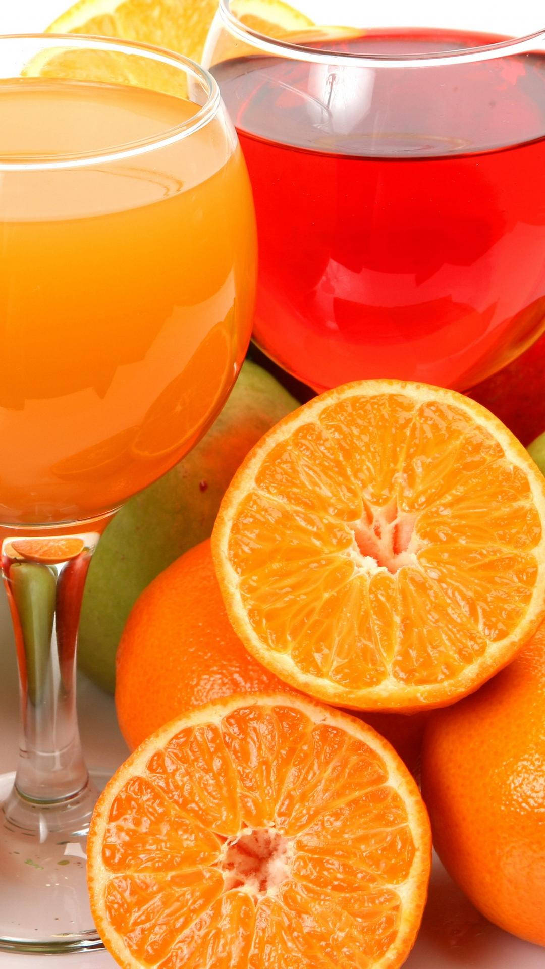 Vibrant Grapefruit Slices And Fresh Juice Background