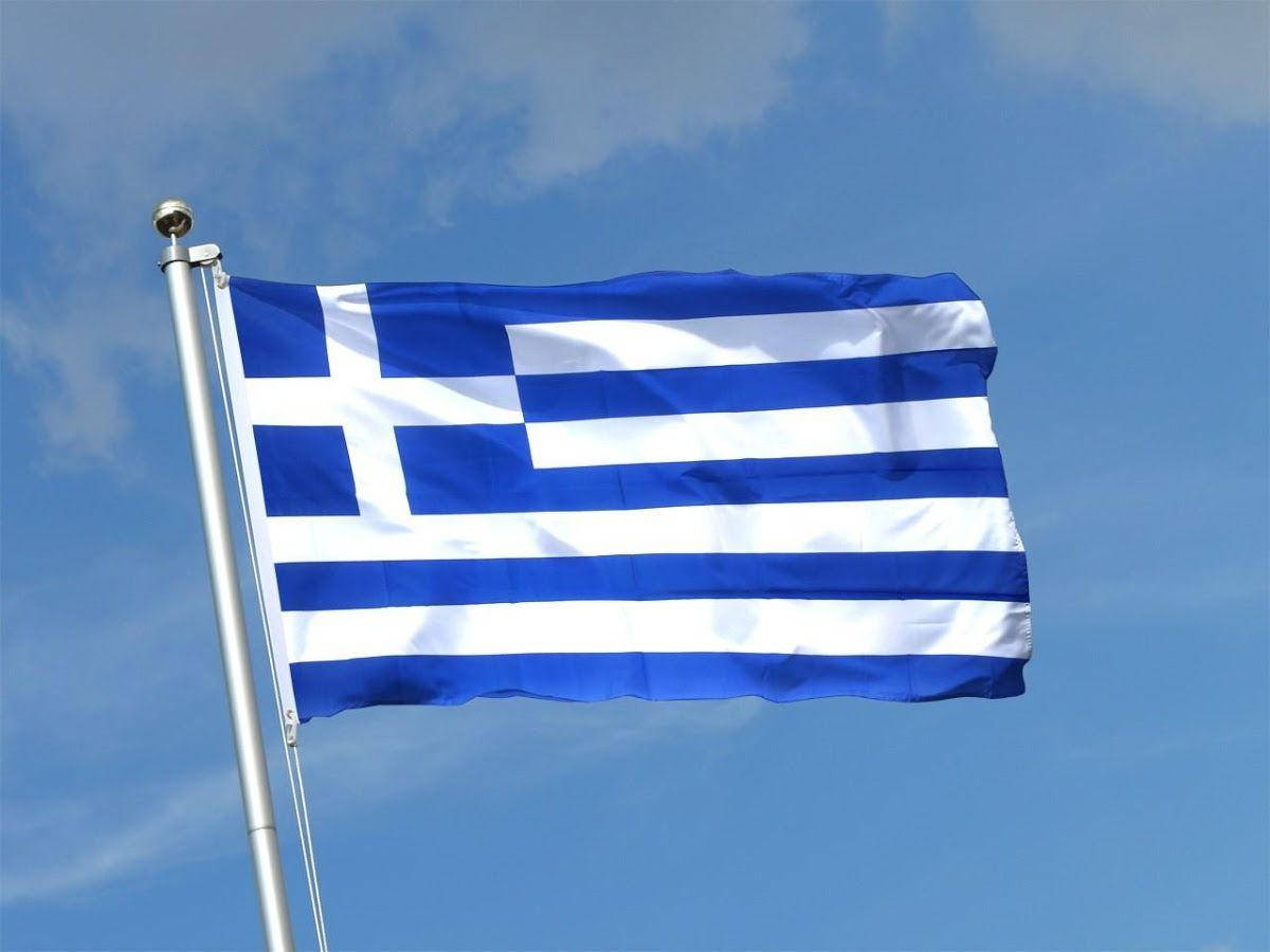 Vibrant Greek Flag Waving In The Wind Background
