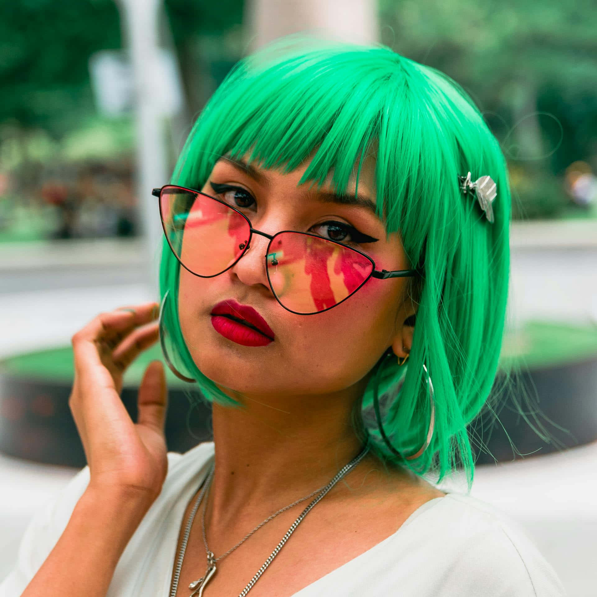 Vibrant Green Hair Fashion Portrait