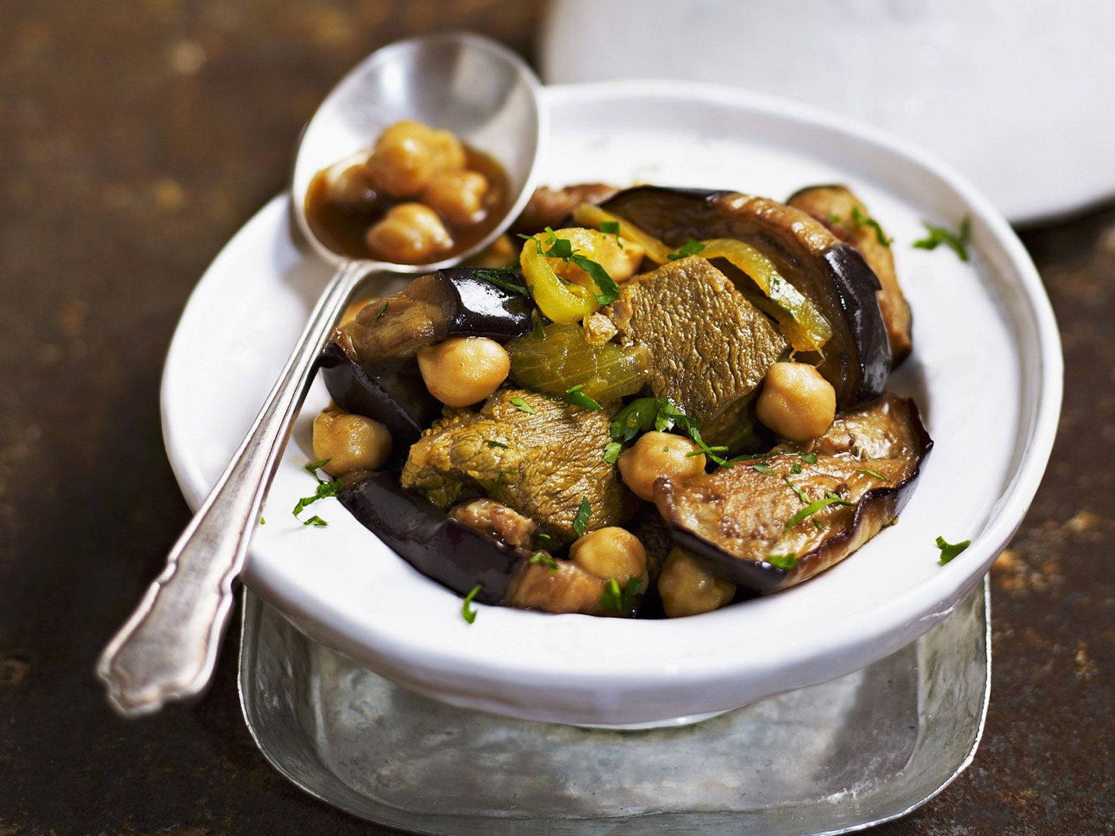 Vibrant Healthy Vegetable Tajine In A White Bowl Background