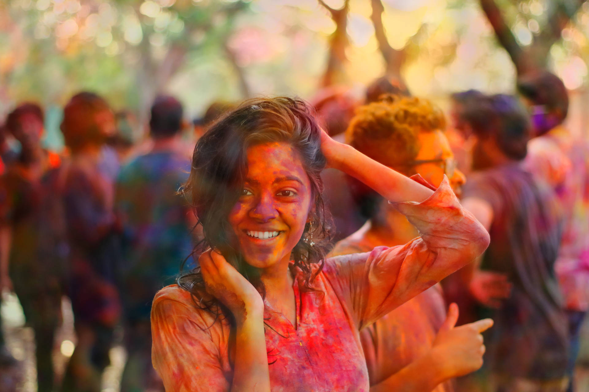 Vibrant Holi Celebration With Beautiful Indian Girl Background