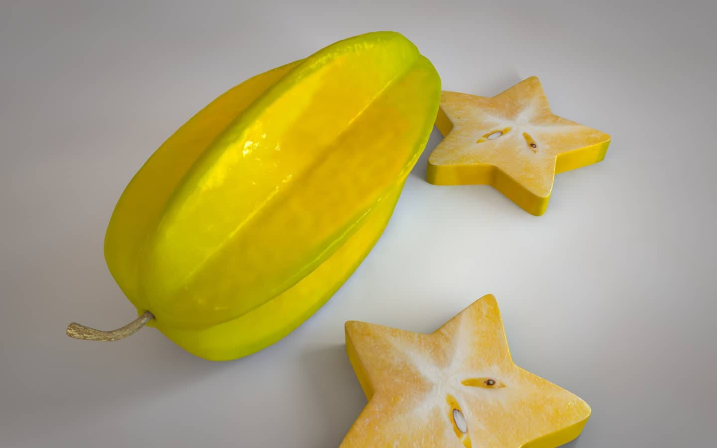 Vibrant Image Of Two Slices Of Star Fruit