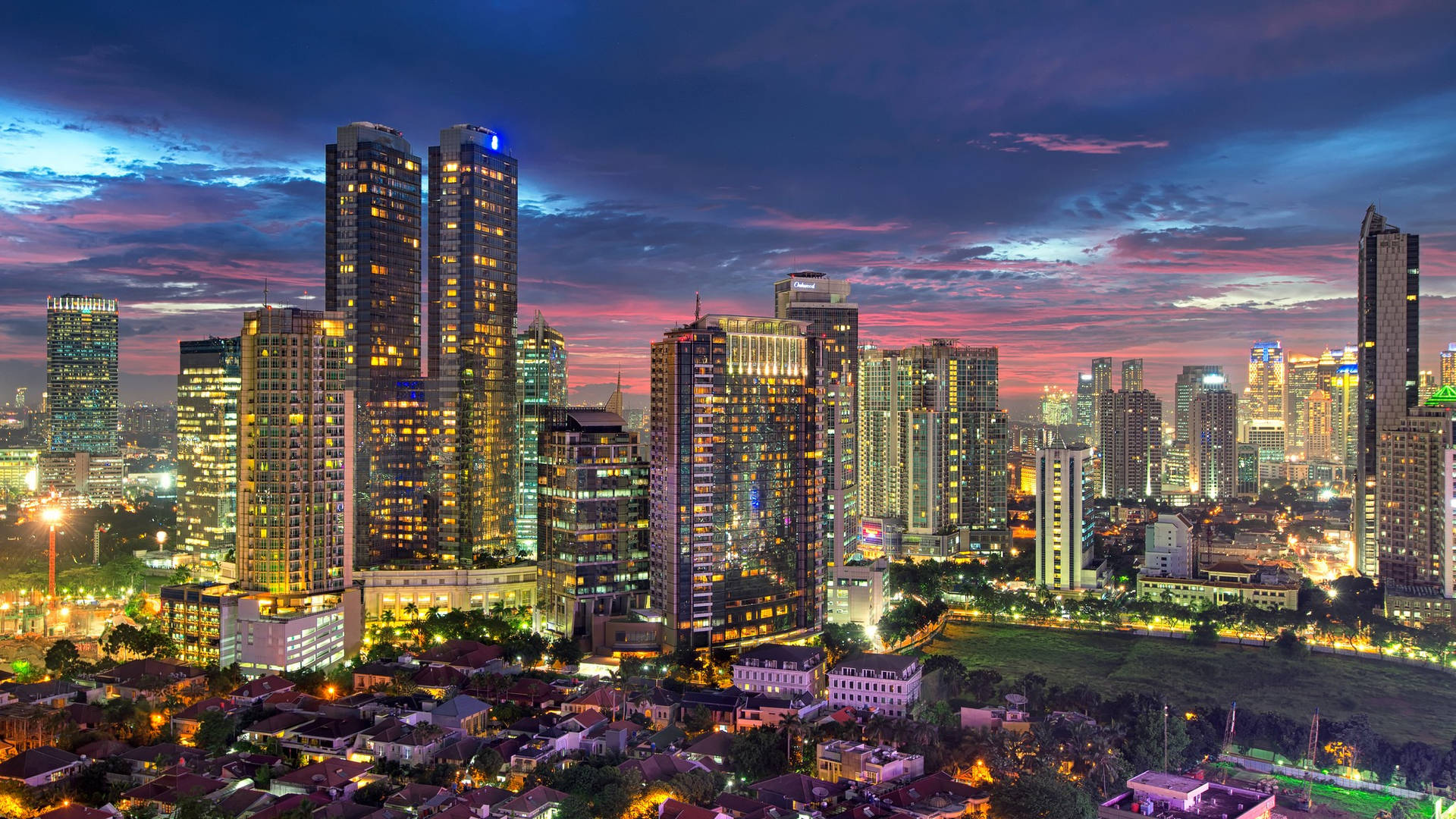 Vibrant Jakarta City Skyline Amidst Bustling Establishments