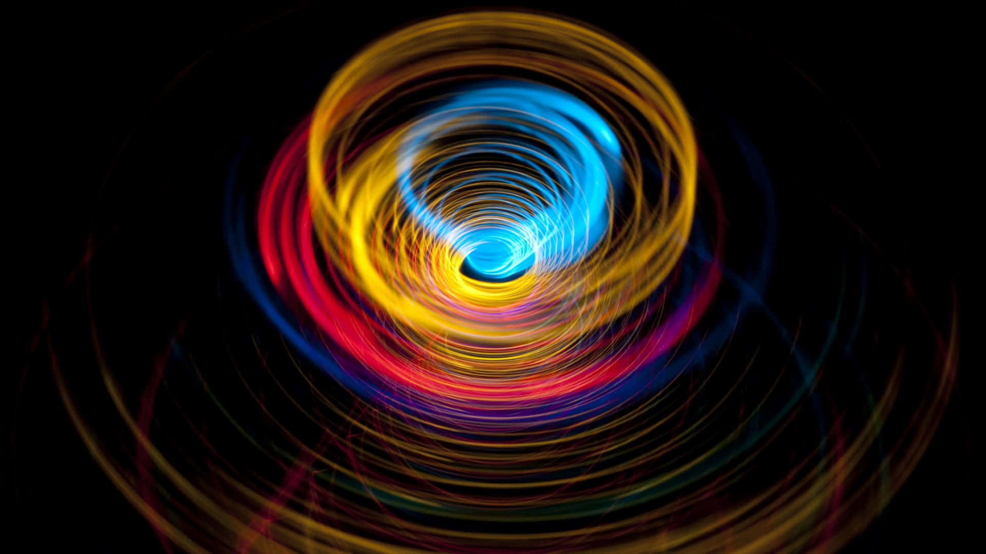Vibrant Lines In Spinning Motion Background