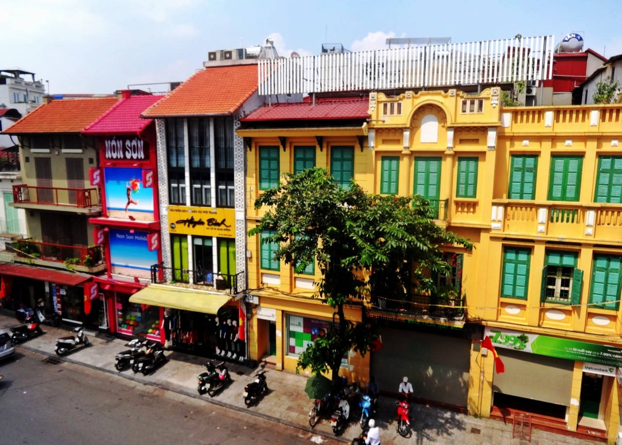 Vibrant Multicolored Buildings In Hanoi Background