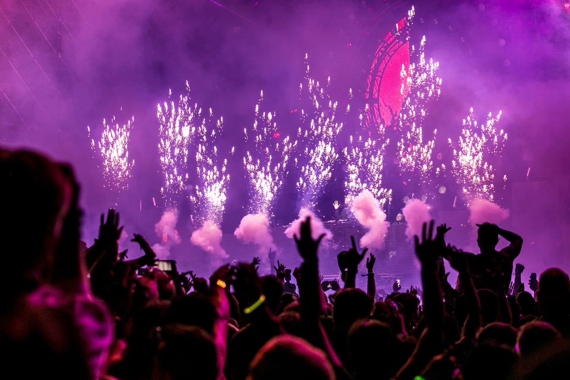 Vibrant Music Festival Under The Night Sky Background