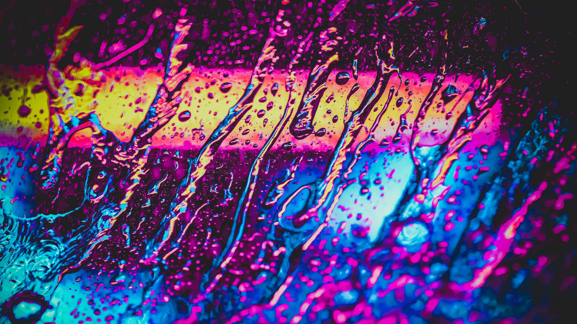 Vibrant Neon Raindropson Glass Background