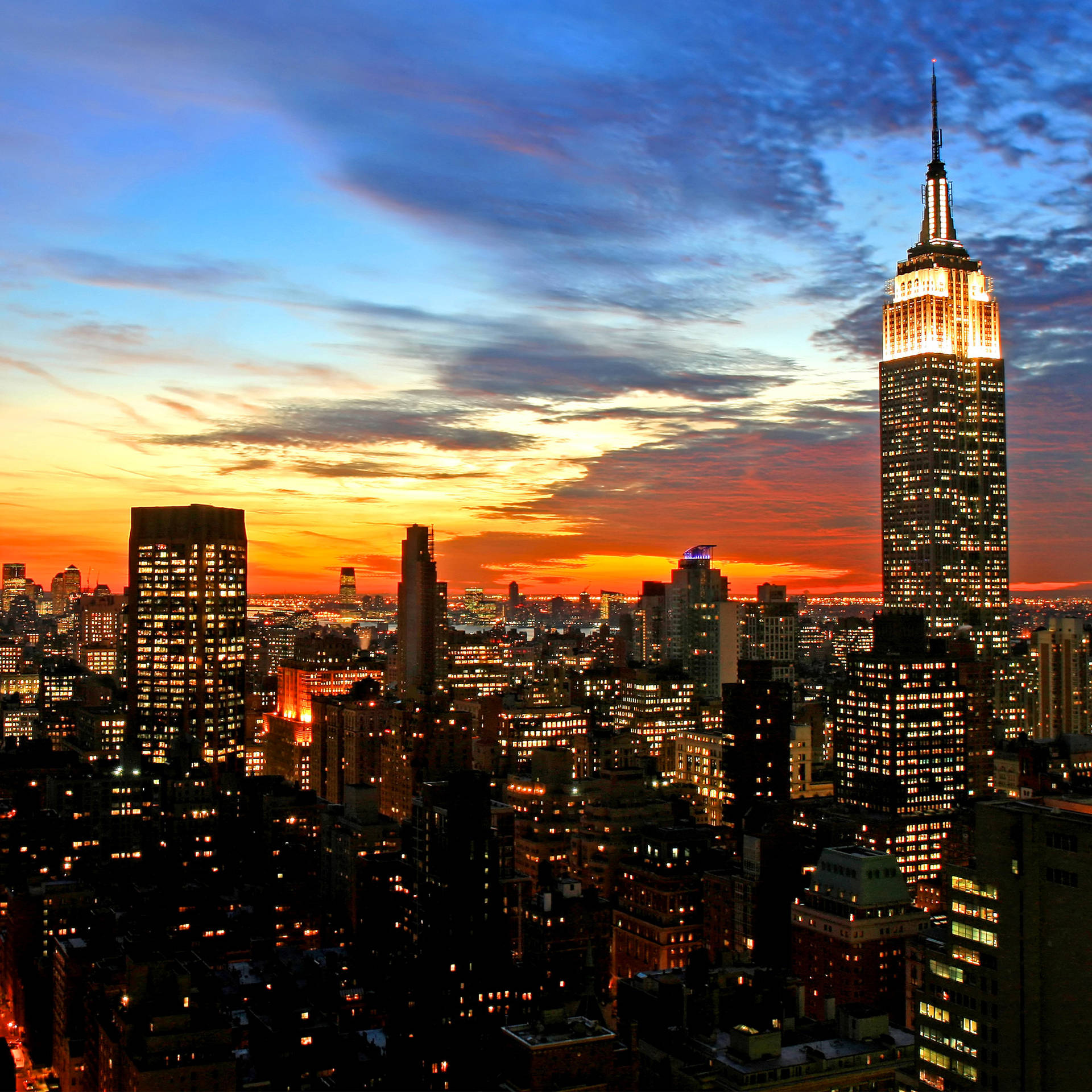 Vibrant New York City Skyline Viewed From The Comfort Of Your Iphone Background